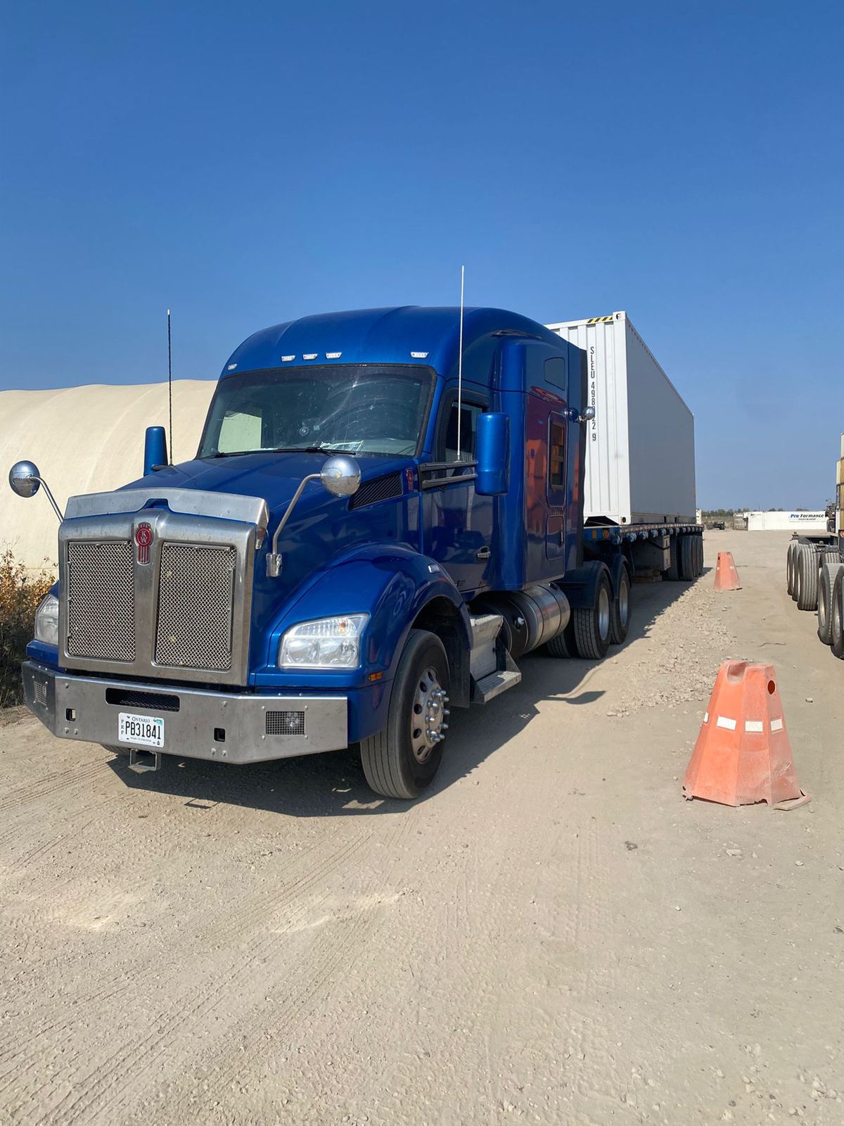 Front view of a blue Novalight Kenworth tractor