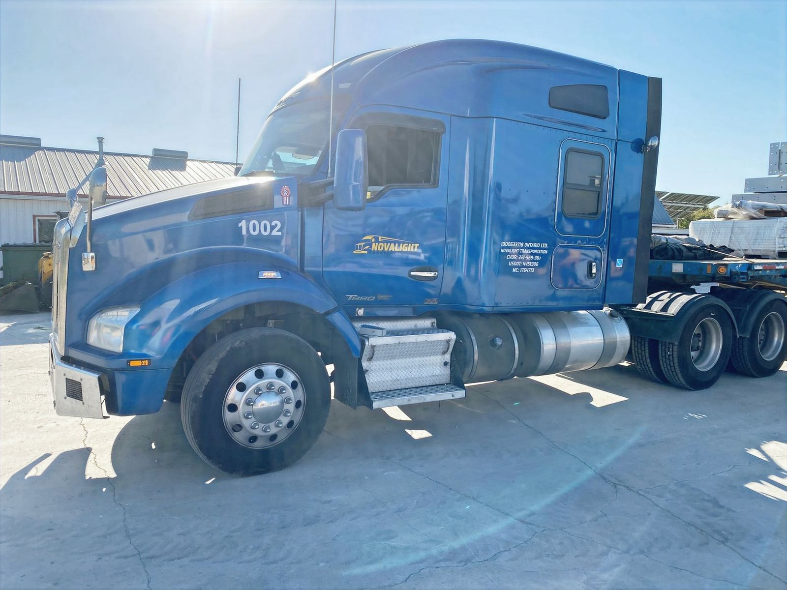 Close-up of a Novalight Transportation blue tractor unit